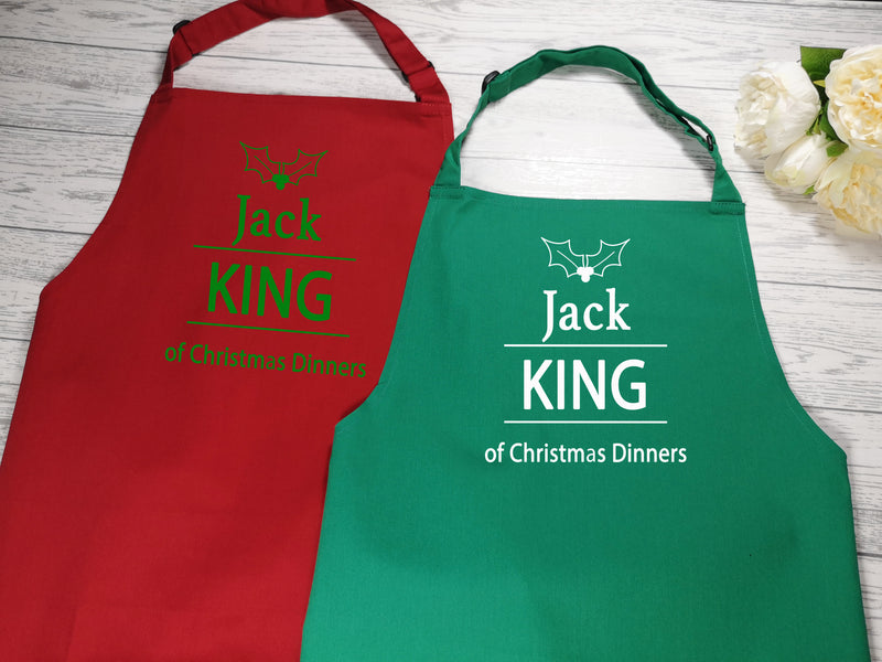 Personalised adult King of Christmas dinner apron in red or green