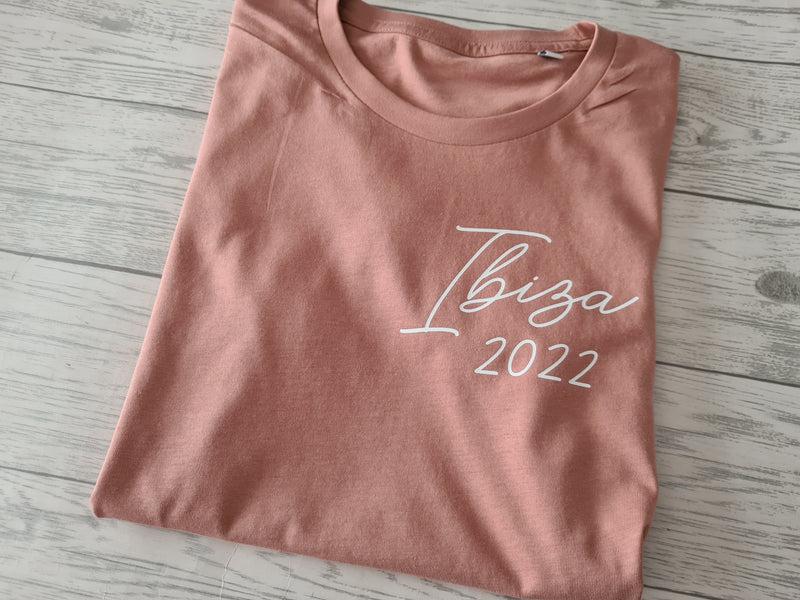 Personalised Women's Dusky pink t-shirt Holdiay year any country in a choice of colour detail