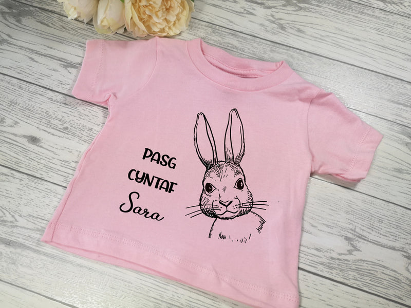 Personalised Baby pink  Easter bunny Baby t-shirt with Pasg cyntaf NAME detail
