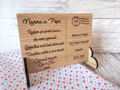 Personalised Engraved oak veneer Welsh We miss you Postcard isolation keepsake