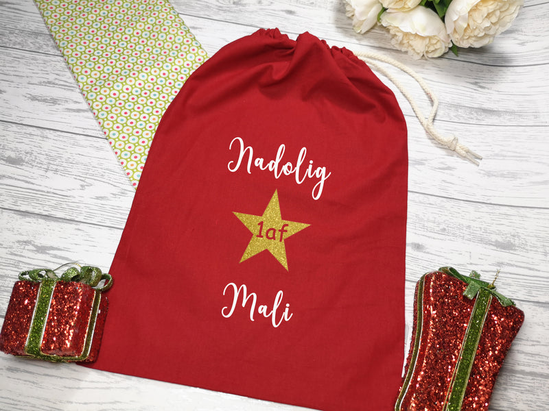 Personalised Small RED welsh nadolig cyntaf Santa sack bag add a name