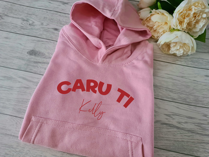 Personalised Welsh Kids Baby Pink hoodie with CARU TI name detail