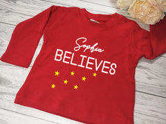 Personalised Baby Christmas RED t-shirt Name believes detail in a choice of colours