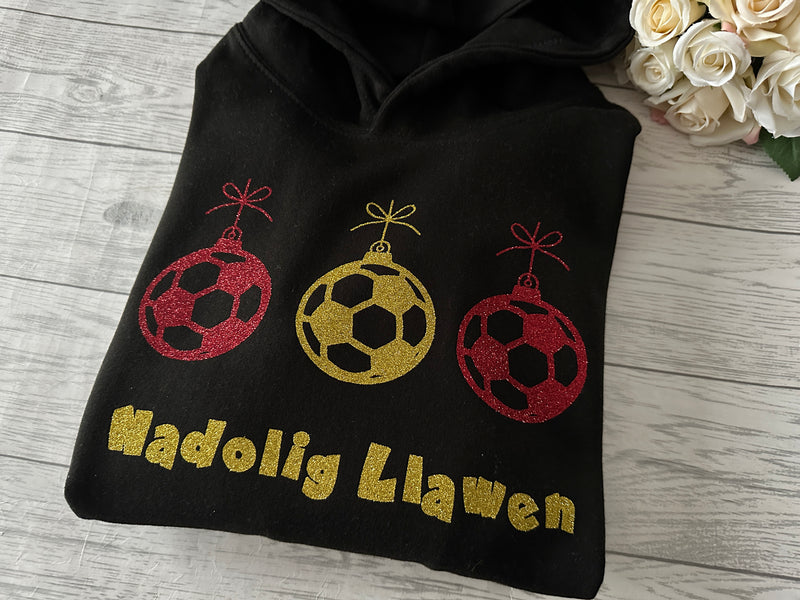 Personalised welsh Kids BLACK Christmas football hoodie with glitter nadolig llawen detail