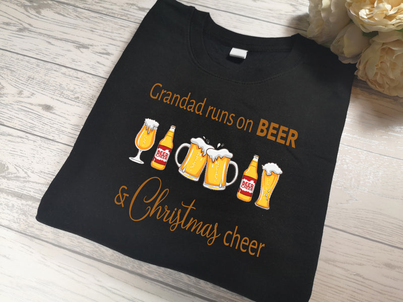 Personalised Unisex BLACK NAME runs on BEER & christmas cheer Christmas jumper