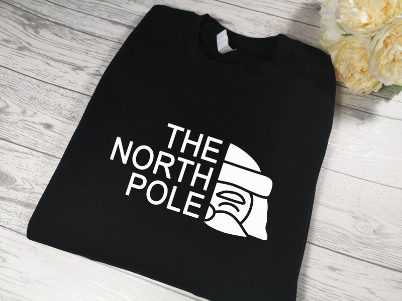Custom Unisex BLACK The North Pole Christmas jumper  in a choice of detail colour