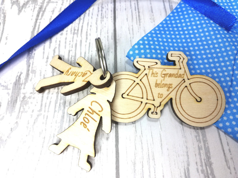 Personalised Wooden bike with boy and girl figures Key ring This Dad belongs to..