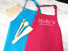 Personalised children's play dough apron in pink or blue