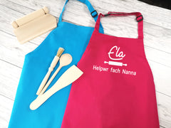 Personalised children's Welsh Helpwr bach / fach apron in pink or blue