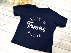 Personalised NAVY Baby t-shirt with It's a NAME thing detail