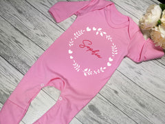Personalised Baby pink Baby grow with name and hearts circle detail