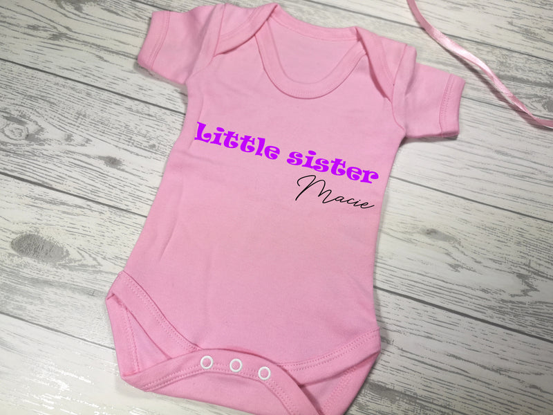 Personalised Baby pink Little Sister Baby vest suit with name detail in a choice of colours