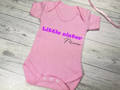 Personalised Baby pink Little Sister Baby vest suit with name detail in a choice of colours