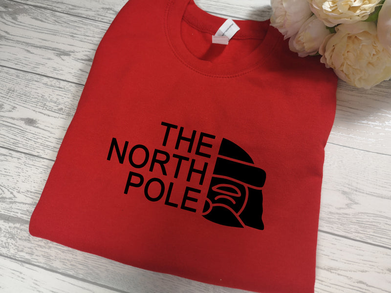 Custom Unisex RED The North Pole Christmas jumper  in a choice of detail colour