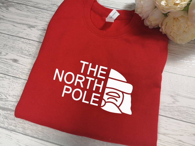 Custom Unisex RED The North Pole Christmas jumper  in a choice of detail colour