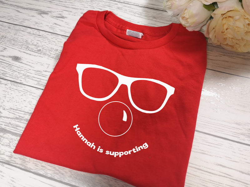 Personalised Red nose day face kids RED t-shirt with Name is supporting detail